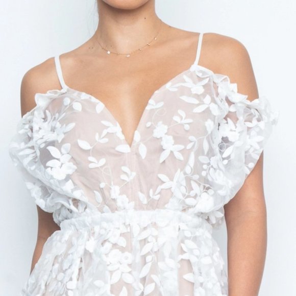 Ivory Sleeveless lcey Romper - Picture 2 of 6